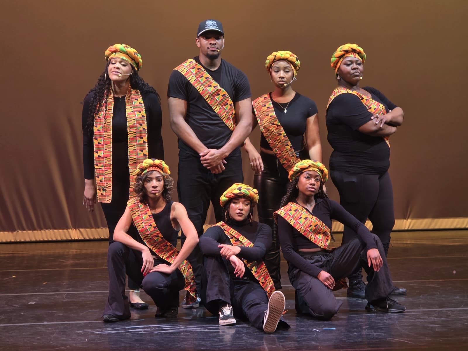 Ensemble stage photo in kente costumes
